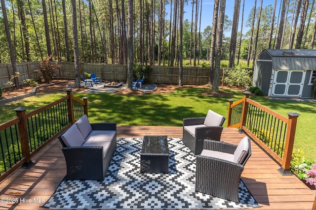 16 Starlit Ln, Pinehurst, NC 28374 - wooden deck with an outdoor hangout area, a fenced backyard, and a storage unit