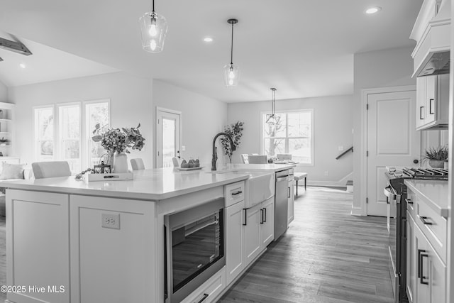 1165 Burning Tree Rd, Pinehurst, NC 28374 - kitchen featuring appliances with stainless steel finishes, light countertops, white cabinetry, and recessed lighting