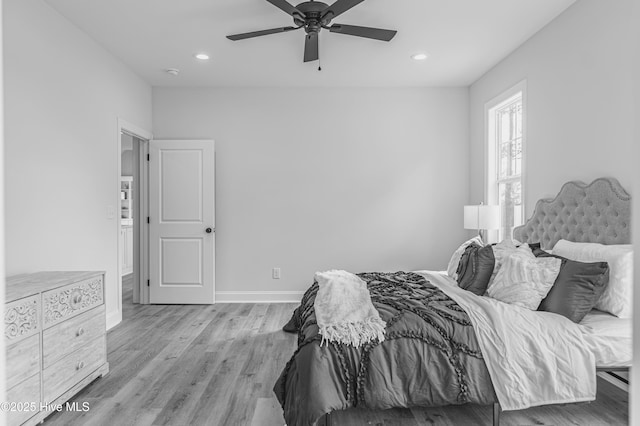 1165 Burning Tree Rd, Pinehurst, NC 28374 - bedroom with recessed lighting, light wood-type flooring, and a ceiling fan