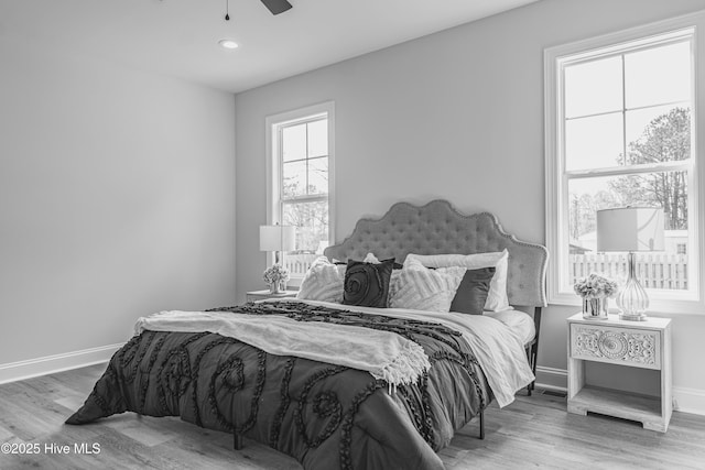 1165 Burning Tree Rd, Pinehurst, NC 28374 - bedroom with wood finished floors, recessed lighting, and a ceiling fan