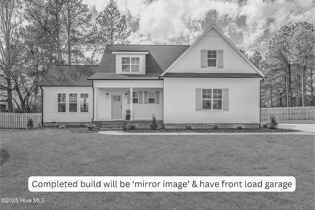 1165 Burning Tree Rd, Pinehurst, NC 28374 - view of front of home with covered porch and roof with shingles