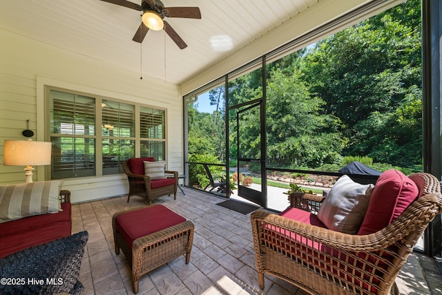 2675 Four Oak Rd, Southport, NC 28461 - sunroom / solarium featuring an outdoor living space and a ceiling fan