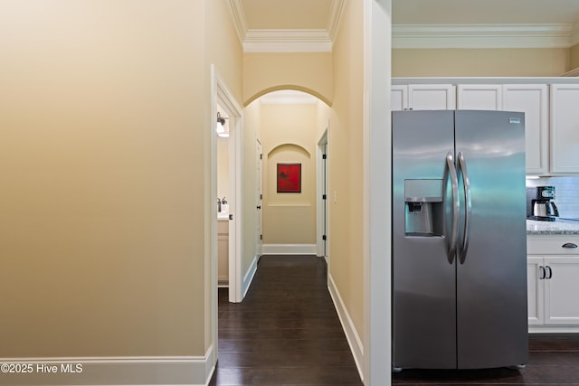 2675 Four Oak Rd, Southport, NC 28461 - corridor with arched walkways, ornamental molding, and dark wood-type flooring