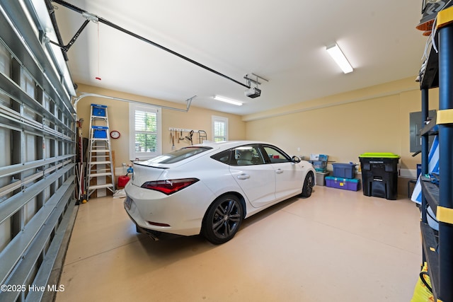 2675 Four Oak Rd, Southport, NC 28461 - garage featuring a garage door opener