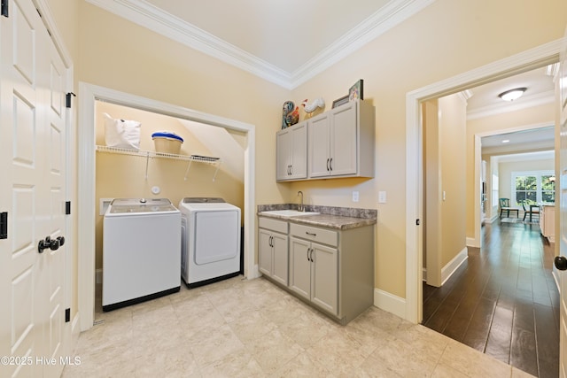 2675 Four Oak Rd, Southport, NC 28461 - laundry area with independent washer and dryer, crown molding, and bar with sink