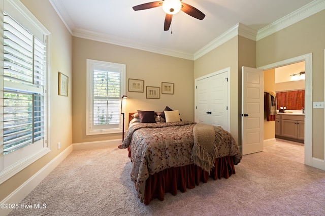 2675 Four Oak Rd, Southport, NC 28461 - bedroom with light carpet, ornamental molding, a ceiling fan, and ensuite bathroom
