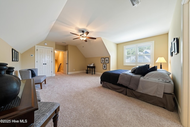 2675 Four Oak Rd, Southport, NC 28461 - bedroom featuring carpet floors, vaulted ceiling, and a ceiling fan