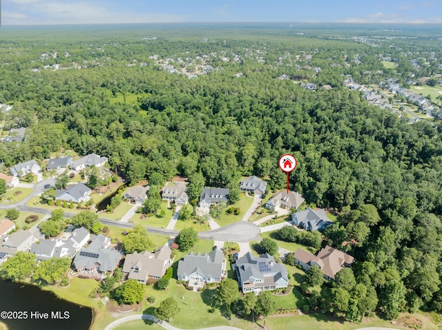 2675 Four Oak Rd, Southport, NC 28461 - aerial view of property's location with nearby suburban area and a forest