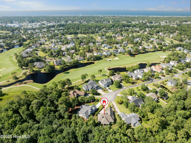 2675 Four Oak Rd, Southport, NC 28461 - aerial overview of property's location with nearby suburban area, a local golf course, and a large body of water