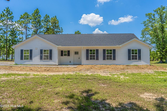 481 Peggy Mill Rd, Hamlet, NC 28345 - single story home featuring a front lawn and roof with shingles