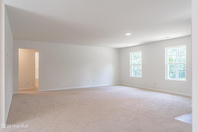 481 Peggy Mill Rd, Hamlet, NC 28345 - spare room with light colored carpet and recessed lighting