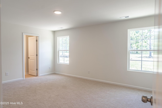 481 Peggy Mill Rd, Hamlet, NC 28345 - spare room with light colored carpet and baseboards