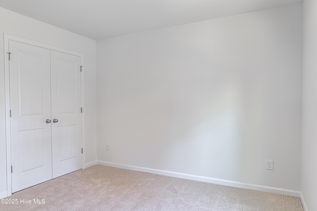481 Peggy Mill Rd, Hamlet, NC 28345 - unfurnished bedroom featuring carpet and a closet
