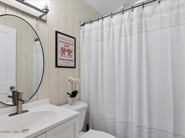 2670 Longleaf Dr SW, Pinehurst, NC 28374 - full bath with vanity and wooden walls