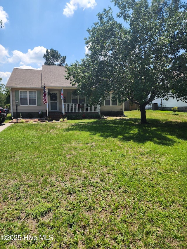 207 Cherry Rd, Southport, NC 28461 - view of front of property with a front yard and a porch