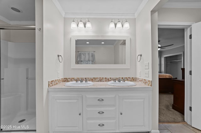 116 Waterside Dr, Bath, NC 27808 - full bath with ornamental molding, double vanity, a shower stall, connected bathroom, and a ceiling fan