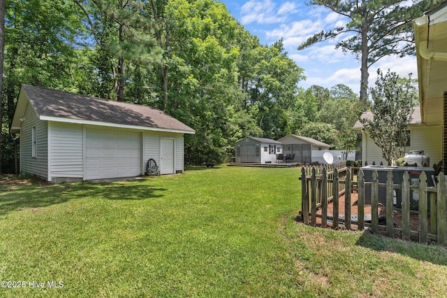 116 Waterside Dr, Bath, NC 27808 - view of yard featuring an outbuilding and a detached garage