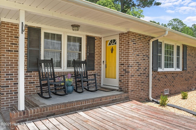 116 Waterside Dr, Bath, NC 27808 - doorway to property with a porch, brick siding, and crawl space