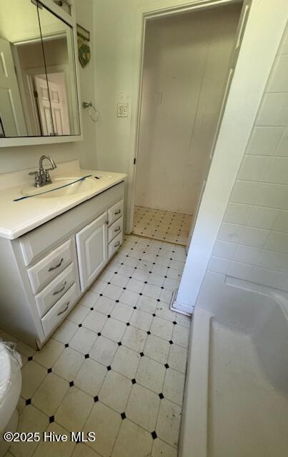 1522 Parson Grove Church Rd, Wadesboro, NC 28170 - full bathroom featuring vanity, tile patterned floors, and a bath