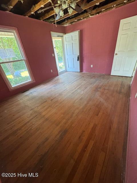 1522 Parson Grove Church Rd, Wadesboro, NC 28170 - empty room with wood finished floors and ceiling fan