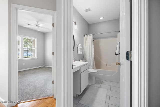 826 Shelton Ct, Wilmington, NC 28412 - bathroom with shower / bath combo with shower curtain, vanity, a ceiling fan, and tile patterned floors