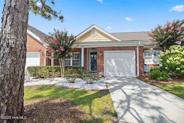 826 Shelton Ct, Wilmington, NC 28412 - view of front of home with brick siding, a garage, and driveway