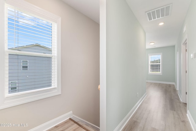 107 Pasture Ln Unit B, Swansboro, NC 28584 - hallway with light wood finished floors and baseboards