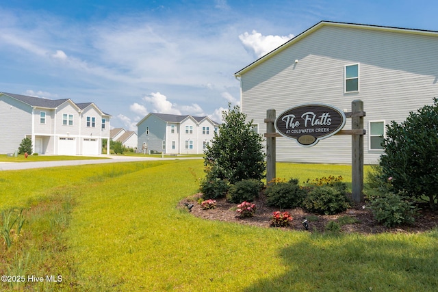 107 Pasture Ln Unit B, Swansboro, NC 28584 - community sign with a garage, a residential view, and a yard