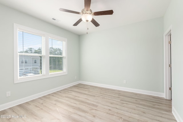 107 Pasture Ln Unit B, Swansboro, NC 28584 - unfurnished room with light wood-style floors and a ceiling fan