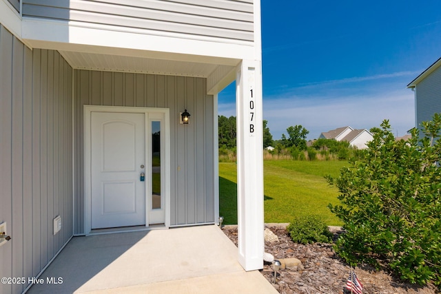 107 Pasture Ln Unit B, Swansboro, NC 28584 - view of exterior entry with a yard