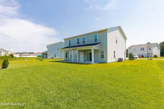 107 Pasture Ln Unit B, Swansboro, NC 28584 - back of property with a lawn, a patio, and a residential view