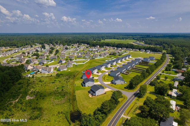 107 Pasture Ln Unit B, Swansboro, NC 28584 - aerial view of property and surrounding area featuring a forest and nearby suburban area