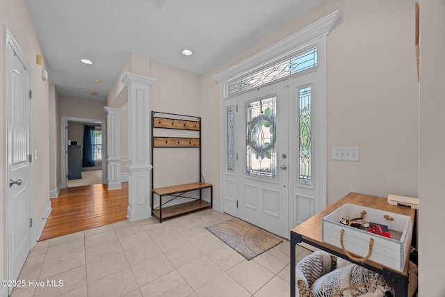 106 Blue Heron Cir, Sneads Ferry, NC 28460 - foyer entrance featuring decorative columns, light tile patterned floors, and recessed lighting