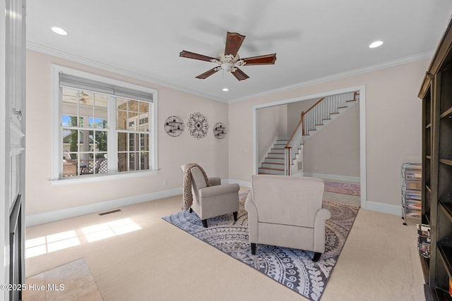 106 Blue Heron Cir, Sneads Ferry, NC 28460 - living area featuring carpet floors, stairs, ceiling fan, ornamental molding, and recessed lighting