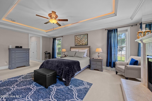 106 Blue Heron Cir, Sneads Ferry, NC 28460 - carpeted bedroom featuring a raised ceiling, ornamental molding, and a ceiling fan
