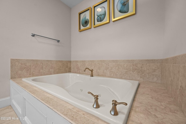 106 Blue Heron Cir, Sneads Ferry, NC 28460 - bathroom with a whirlpool tub and tile patterned flooring