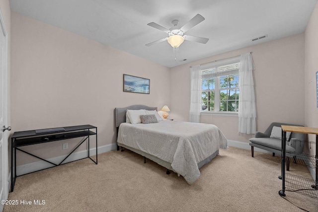 106 Blue Heron Cir, Sneads Ferry, NC 28460 - carpeted bedroom with baseboards and ceiling fan
