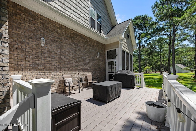 106 Blue Heron Cir, Sneads Ferry, NC 28460 - wooden terrace with a grill and a sunroom