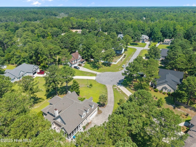 106 Blue Heron Cir, Sneads Ferry, NC 28460 - aerial view of property and surrounding area with a heavily wooded area and nearby suburban area