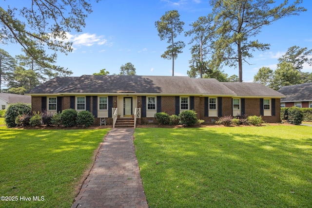 1902 York St, Kinston, NC 28504 - single story home with brick siding, a front yard, and a shingled roof