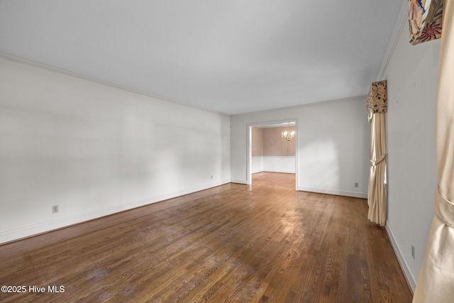 1902 York St, Kinston, NC 28504 - unfurnished room featuring wood finished floors and a chandelier