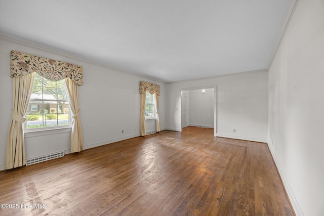 1902 York St, Kinston, NC 28504 - spare room with wood finished floors and ornamental molding