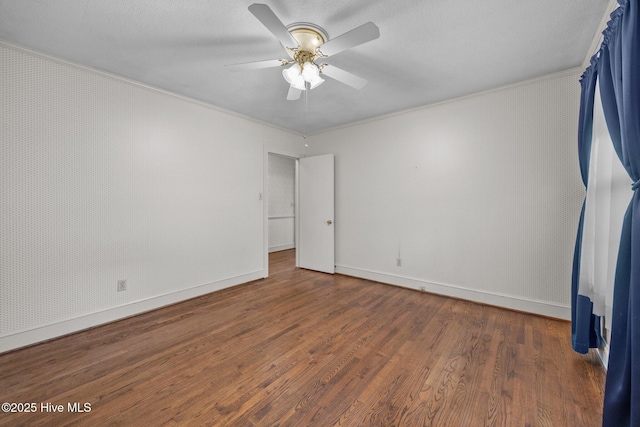 1902 York St, Kinston, NC 28504 - spare room featuring crown molding, ceiling fan, wood finished floors, and a textured ceiling