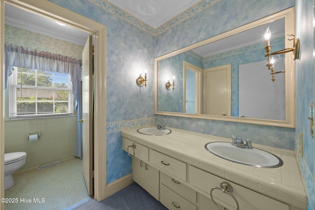 1902 York St, Kinston, NC 28504 - full bathroom featuring wallpapered walls, double vanity, and tile patterned floors