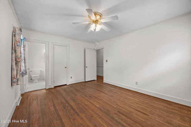 1902 York St, Kinston, NC 28504 - unfurnished bedroom with wood finished floors, connected bathroom, and ceiling fan