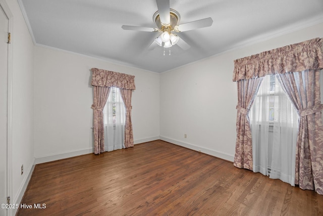 1902 York St, Kinston, NC 28504 - unfurnished room featuring healthy amount of natural light, wood finished floors, ceiling fan, and crown molding