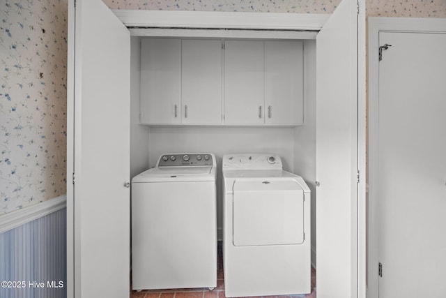 1902 York St, Kinston, NC 28504 - laundry area featuring wallpapered walls, washing machine and dryer, and cabinet space