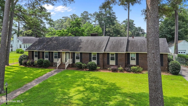 1902 York St, Kinston, NC 28504 - view of front of house with brick siding and roof with shingles