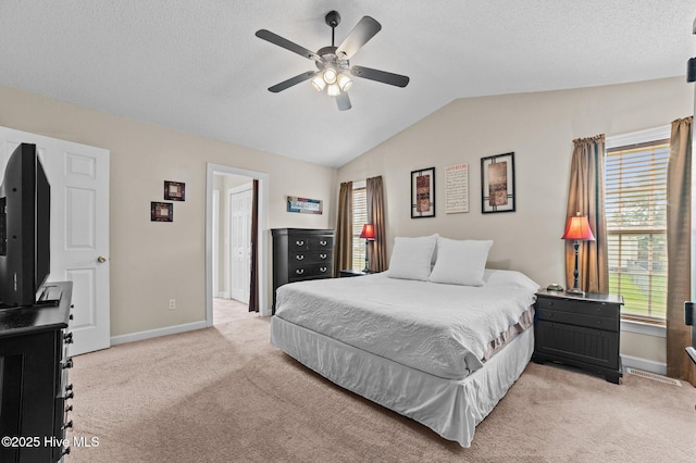 2824 Preston Ln, Grimesland, NC 27837 - bedroom featuring light carpet, vaulted ceiling, a textured ceiling, and a ceiling fan