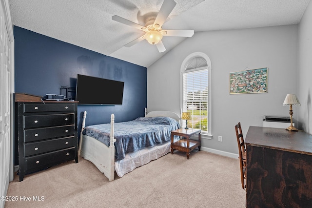 2824 Preston Ln, Grimesland, NC 27837 - bedroom featuring lofted ceiling, carpet floors, a textured ceiling, and a ceiling fan